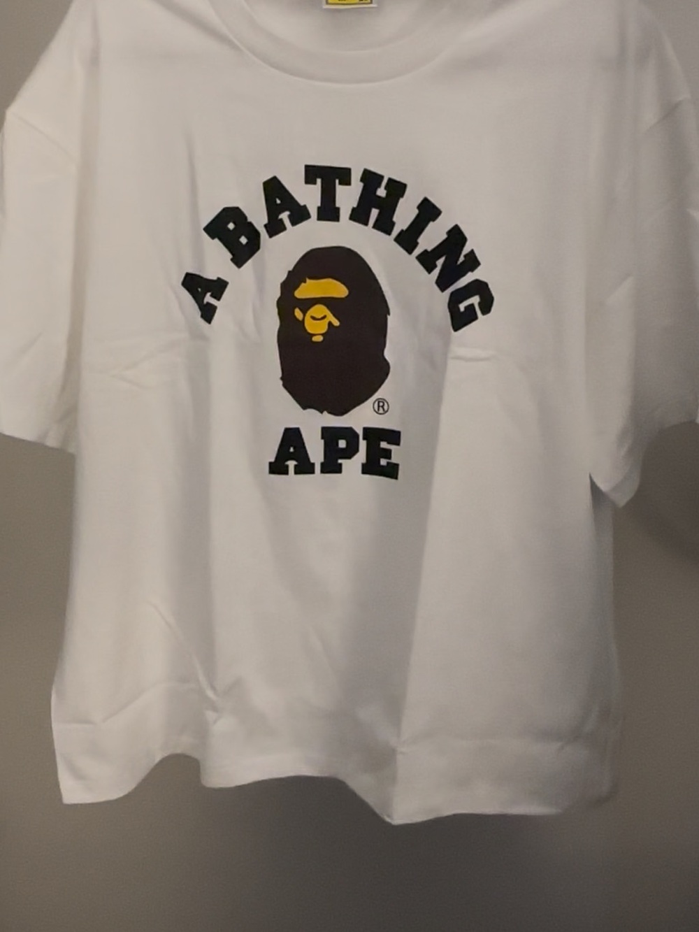 Bape White T-Shirt with Black and Yellow Ape Logo